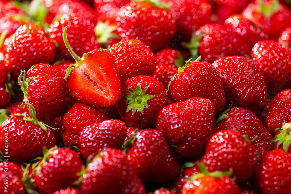 Strawberry raw background, a lot of Fresh red berries, Close up the half of strawberries, Top view, High resolution product. Healthy organic fresh product. Strawberry raw background, a lot of Fresh red berries, Close up the half of strawberries, Top view, High resolution product. Healthy organic fresh product.