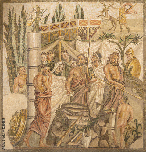 EMPURIES, SPAIN-MAY 8, 2021: Real Roman mosaic depicting the Sacrifice of Iphigenia at Archaeological Remains of ancient city Empuries. Archaeology Museum of Catalonia. photo