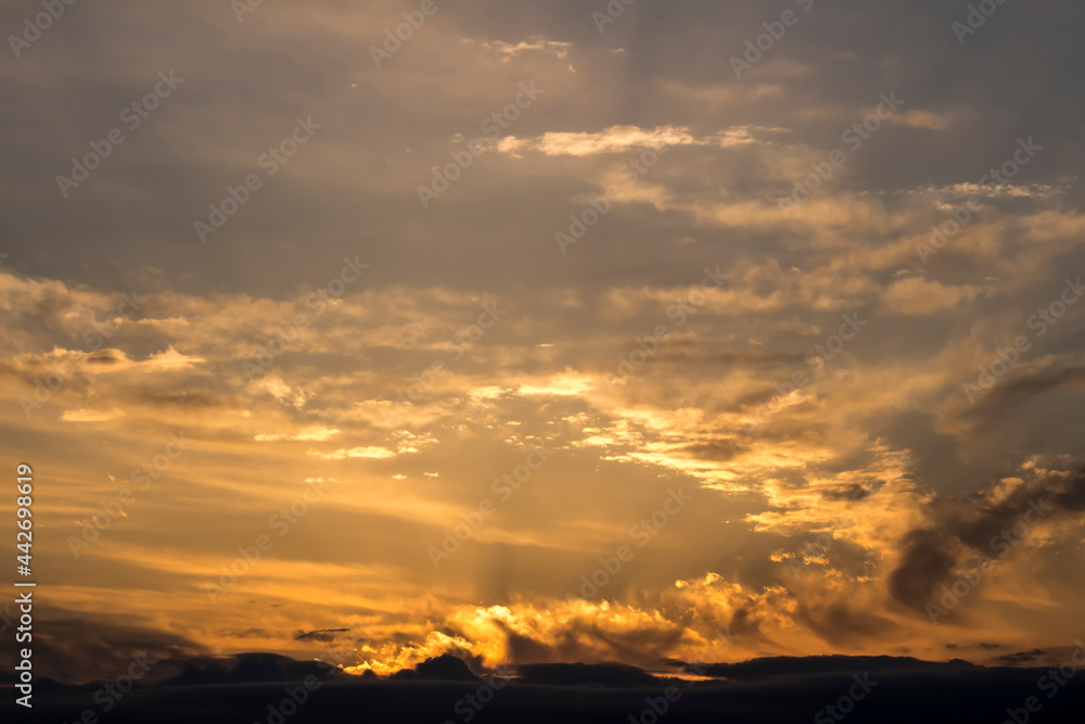 Photograph of the sunset sky as a background material