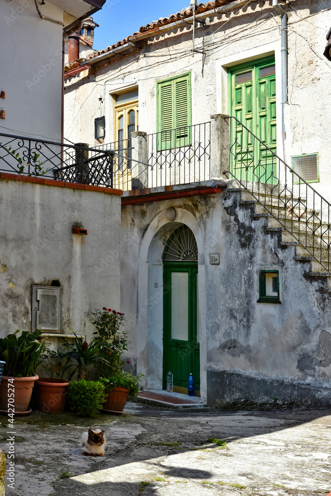 A small street between the old houses of Sant'Angelo d'Alife, a mountain village in the province of Caserta, Italy.