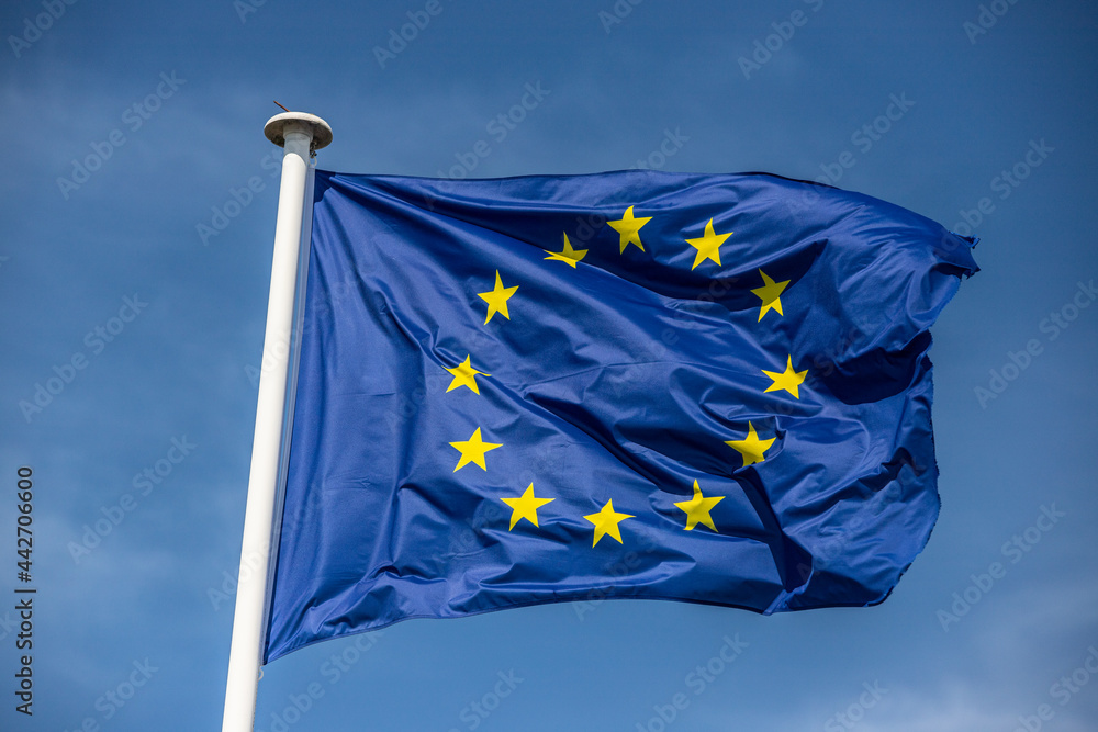 european flag blowing in blue sky european flag blowing in blue sky
