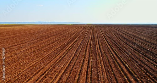 Drone shot of ploughed corn field