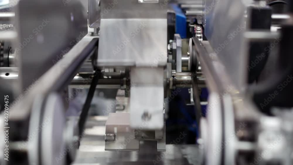 Technological background with automatic production machine. Technological background with automatic production machine.