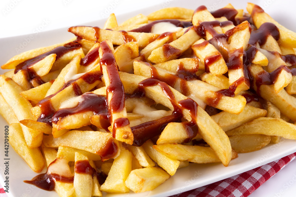 Traditional Canadian Poutine isolated on white background Traditional Canadian Poutine isolated on white background