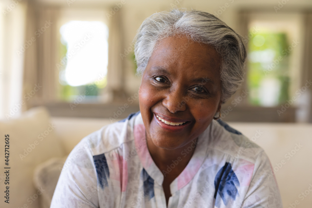 Portrait Of Smiling African American Senior Woman Looking Through Window  Stock Photo - Download Image Now - iStock