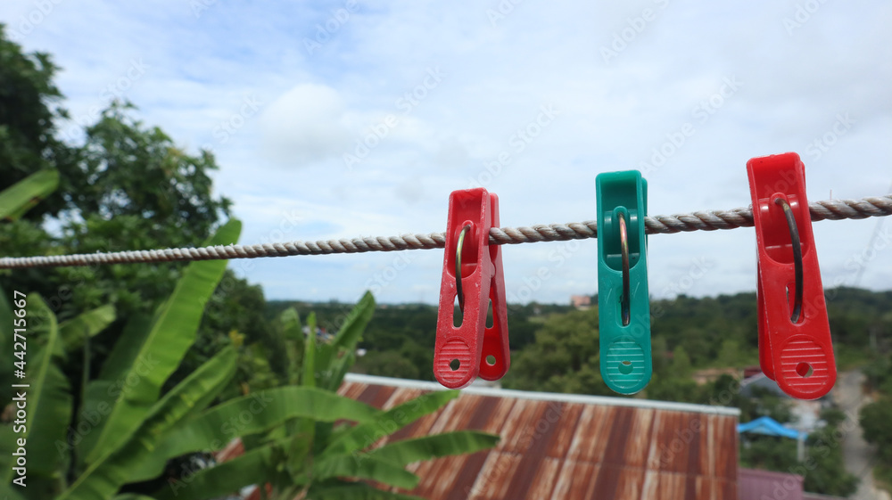 clothespins that have been used to dry clothes in the sun