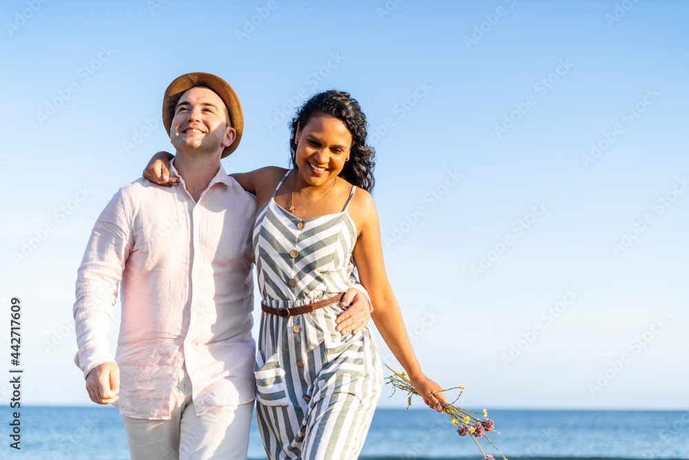 Young couple enjoying time together on the beach