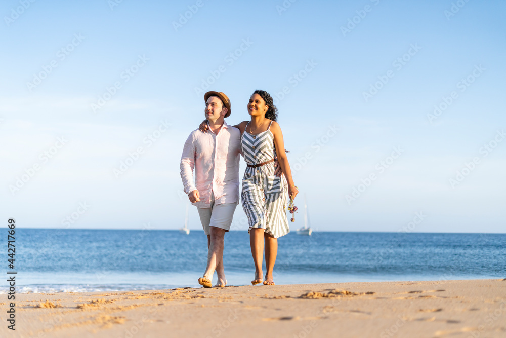 Young couple enjoying time together on the beach