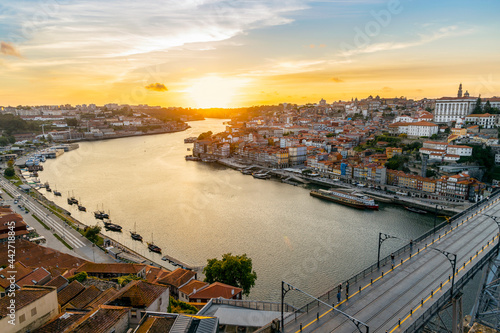 Skyline of the historic city of Porto with bridge by sunset, Portugal © malajscy
