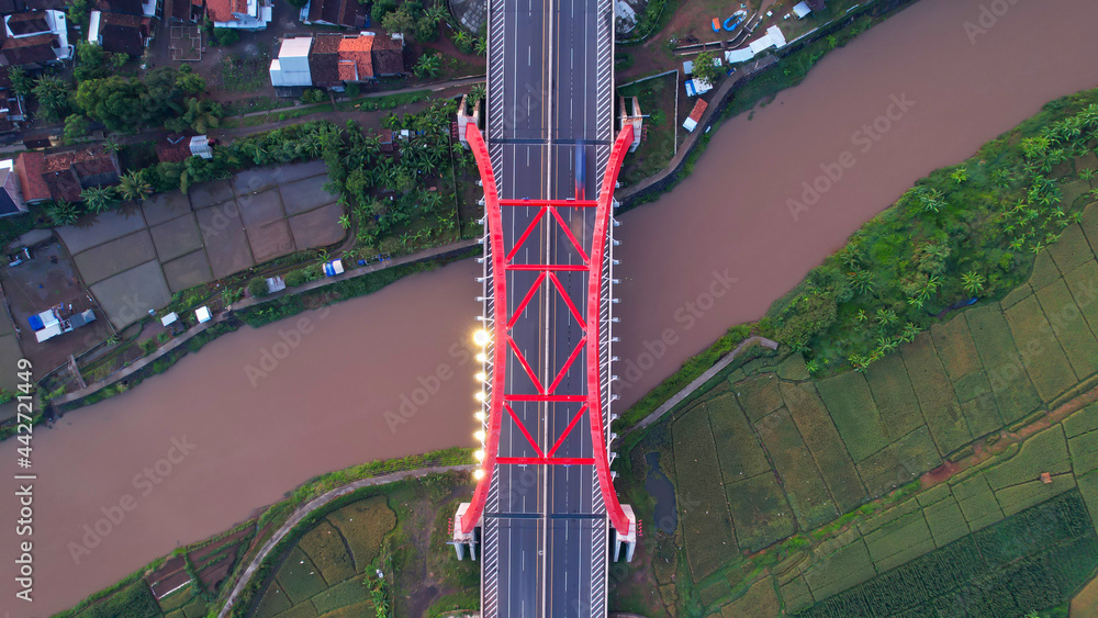 Aerial view of the Kalikuto Bridge, an Iconic Red Bridge at Trans Java ...