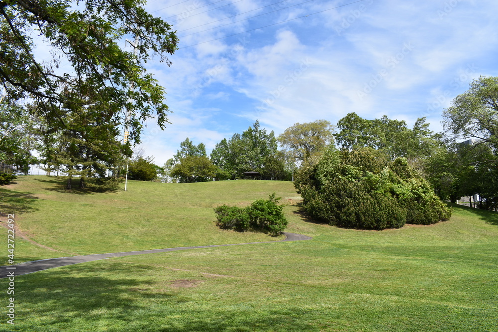 The peaceful Hiragishi Takadai park hill with the beautiful blue sky in Sapporo Japan The peaceful Hiragishi Takadai park hill with the beautiful blue sky in Sapporo Japan