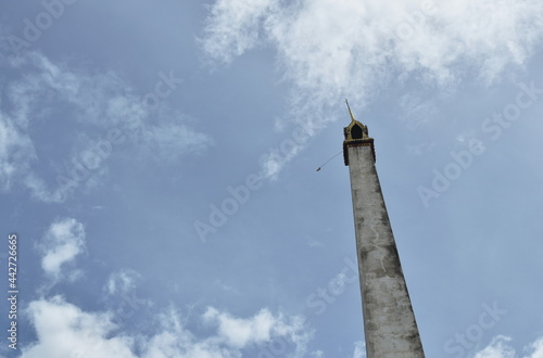 Fényképezés chimney of Thai crematorium furnace building on sky background in Buddhist templ
