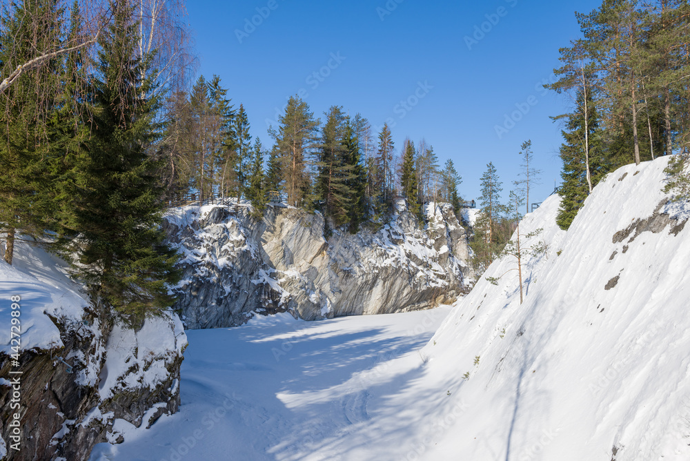 Sunny March day in the Marble Canyon. Ruskeala Mountain Park. Karelia, Russia