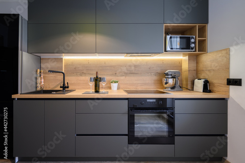 Modern luxury dark gray kitchen photo