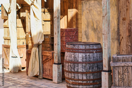 Fototapeta Naklejka Na Ścianę i Meble -  A barrel in greece. Small streets in the resort town. Siesta otpus and relaxation. City decor.