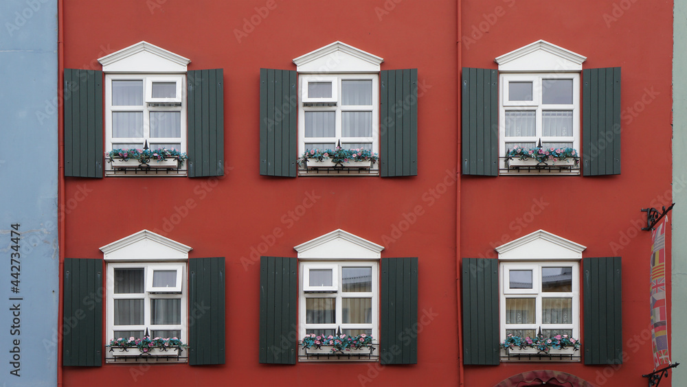 windows of an house, red wall, Reykjavik, Iceland
