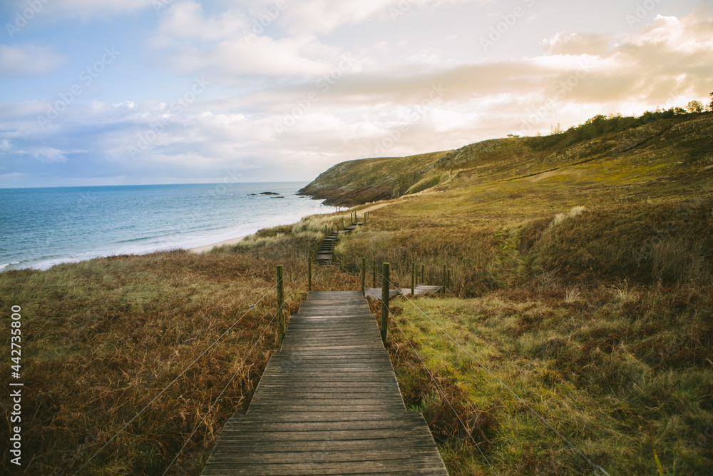 Wooden path to a beach in Brittany