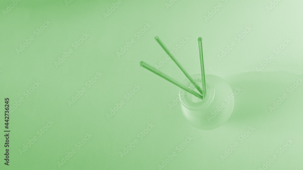 Incense sticks for home isolated on green background, environmentally friendly fragrant air, safe for children, pleasant smell around the house, different flavoring aromas, anti-smoking odor Incense sticks for home isolated on green background, environmentally friendly fragrant air, safe for children, pleasant smell around the house, different flavoring aromas, anti-smoking odor