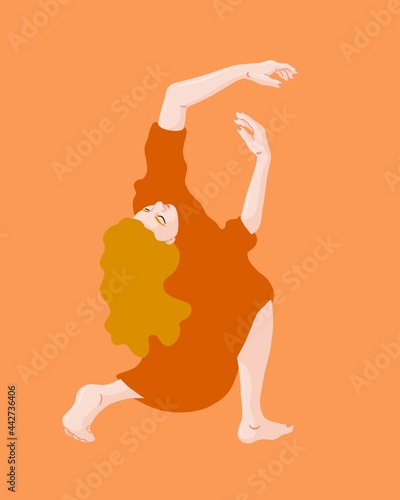 A woman with blonde logn hair dancing expressively photo