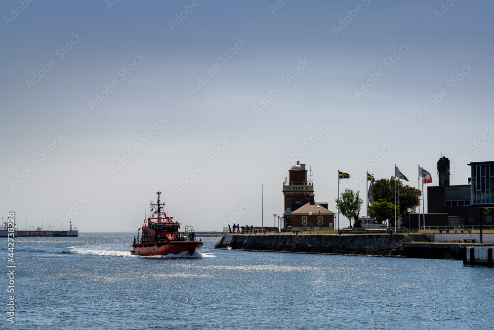 harbor pilot ship arrives in the industrial port of Helsingborg