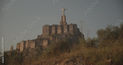 Low Perspective Shot of a Religious Structure on Top Of the Ruins in Spain  photo