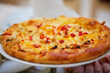 A boring fast food dish pizza. Italian cuisine. Cooking in a restaurant or with your own hands