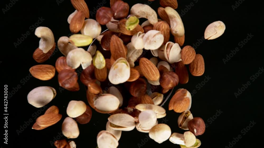 Super Slow Motion Shot of Rotating Various Nuts, Filmed on High Speed Cinematic camera at 1000 fps. Super Slow Motion Shot of Rotating Various Nuts, Filmed on High Speed Cinematic camera at 1000 fps.