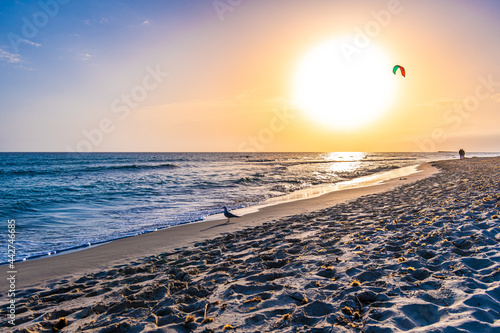 sunset on son bou  beach in menorca, spain
