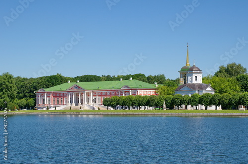 Moscow, Russia - June 17, 2021: View of the Kuskovo estate and the Big Palace Pond on a sunny summer day