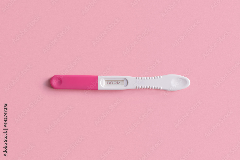 Pregnancy test on pink background Pregnancy test on pink background