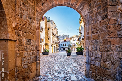 narrow street in old town, ibiza, spain photo