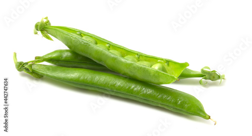 Young green peas on white