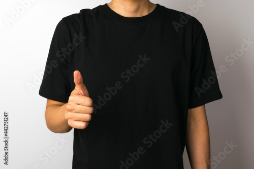 A person making a gesture on a white background