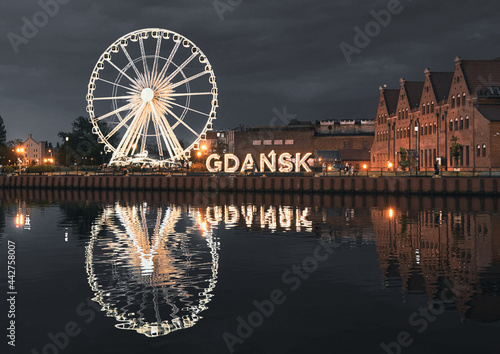 Reflection of ferris wheel in Gdansk Old Town Poland