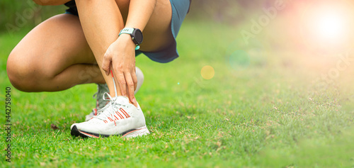 Papier peint Sport woman has sore ankle from exercising training