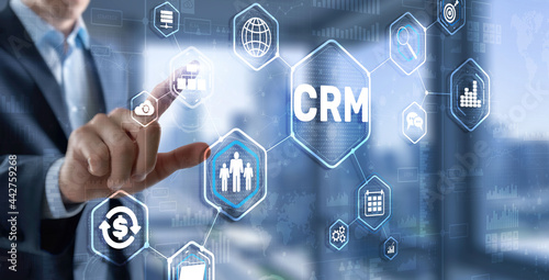 Customer relationship management system concept. Businessman touching finger CRM