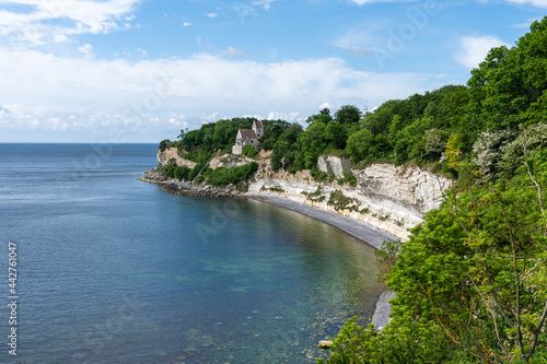 view of the church at Hojerup on top of the white chalkstone cliffs of Stevns Klint photo