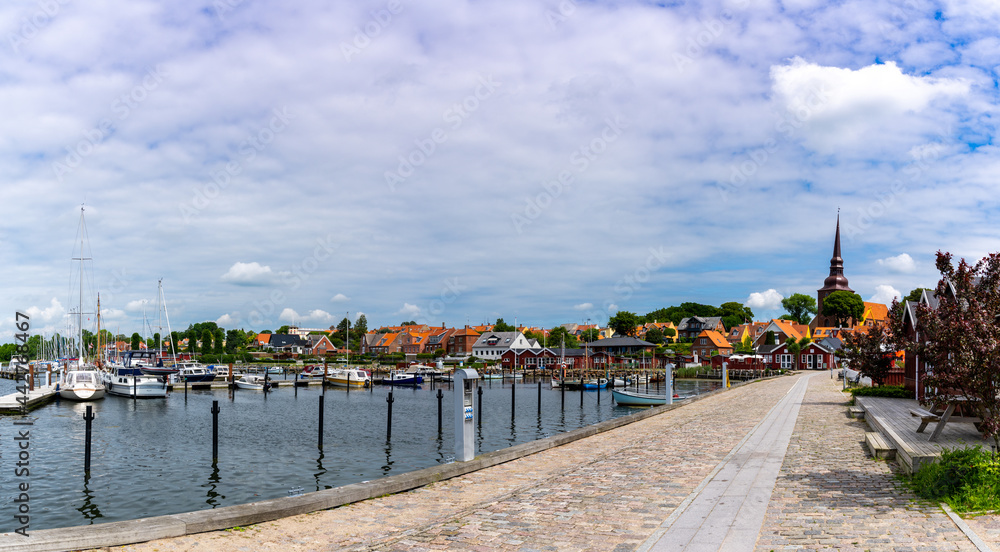panorama view of the harbor front promenade and picturesque town center and marina in Nysted