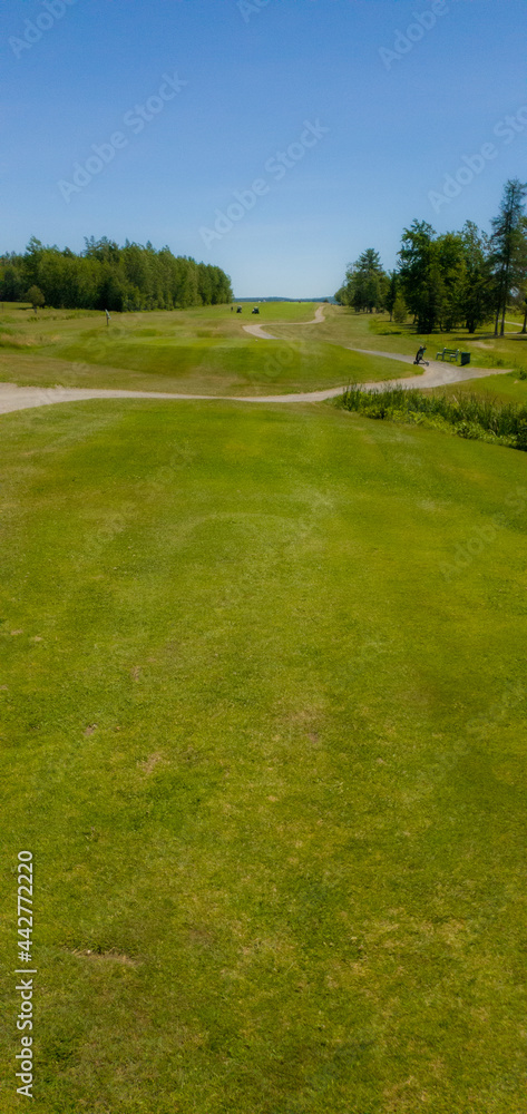 Nice hole on a Canadian golf club in Quebec, on the countryside