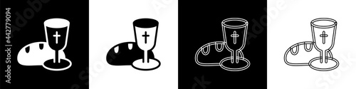 Set Goblet and bread icon isolated on black and white background. Bread and wine cup. Holy communion sign. Vector