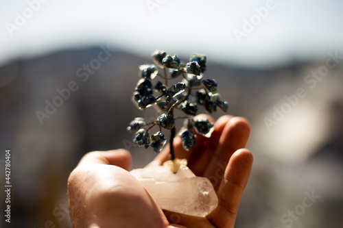 hand with pearl necklace