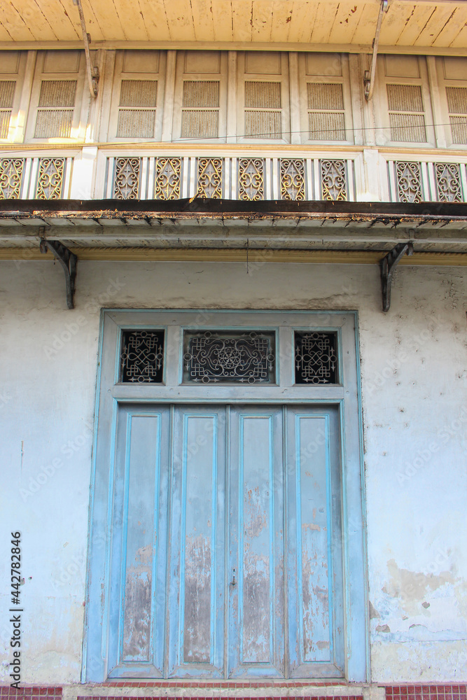 blue door, an old building with classic style, in Kauman Batik Village Surakarta Indonesia