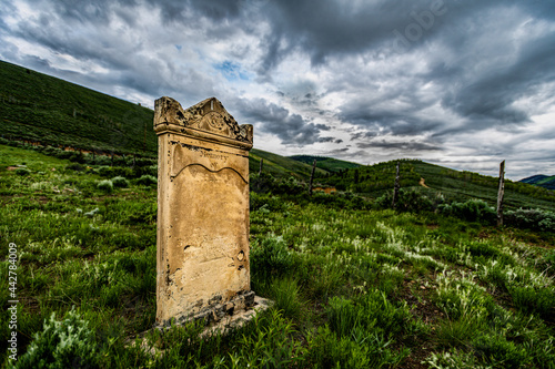 Old headstone in graveyard