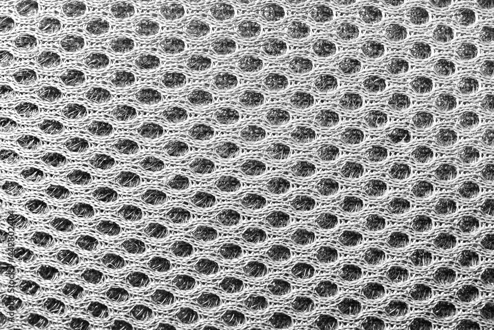 Close-up texture photo of grey colored spacer mesh material pattern. - obrazy, fototapety, plakaty 