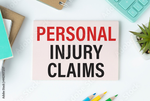 personal injury claim form, business concept text photo
