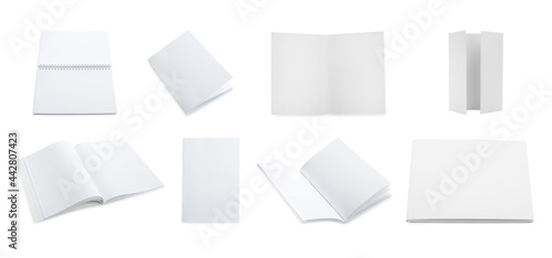 Set with blank paper brochures on white background. Mockup for design © New Africa