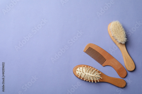 Bamboo brushes and space for text on lavender background  flat lay. Conscious consumption