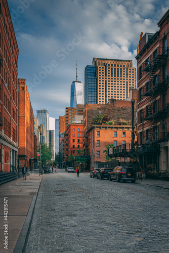 Fotografie Cobblestone street with view of the World Trade Center, in Tribeca, Manhattan, N