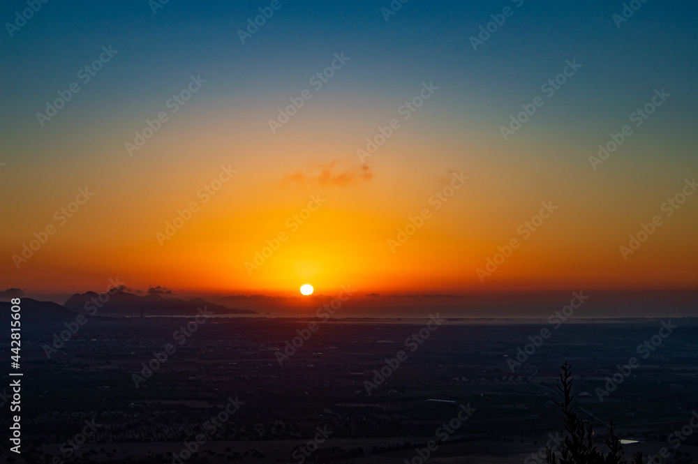 Special Sunrise at Pollença bay- bird flying over mediterranean sea- Orange sky- Colorful sky- Calm water- meditation time