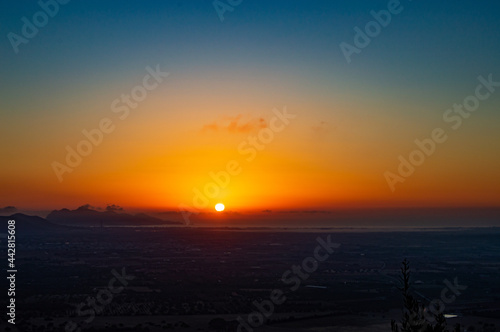 Special Sunrise at Pollença bay- bird flying over mediterranean sea- Orange sky- Colorful sky- Calm water- meditation time